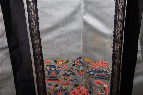 A Chinese embroidered skirt, a pair of embroidered boots, waistcoat and cover